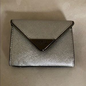 Rebecca Minkoff small wallet in silver (like new)